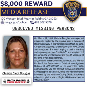 Missing person flyer for Christie Carol Douglas, who disappeared from Warner Robins, GA on March 16, 2016. Offers an $8,000 reward and provides contact info for Warner Robins Police and Macon Regional Crimestoppers.